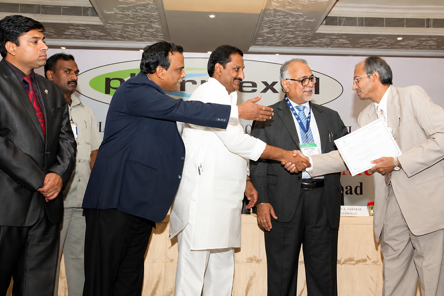 Jyotindra representative receiving export certificate at industry event