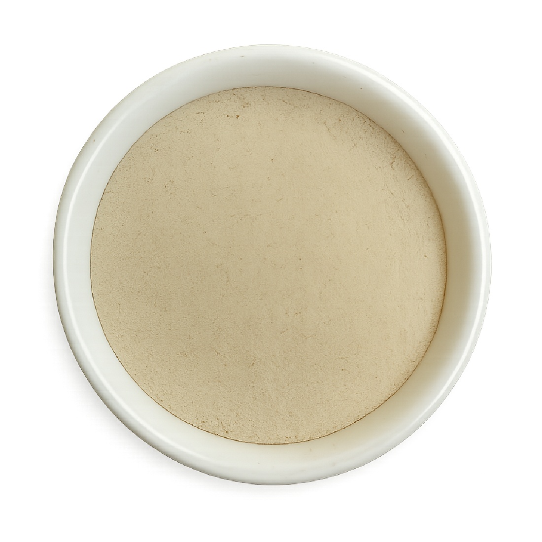 Psyllium husk powder in a white ceramic bowl