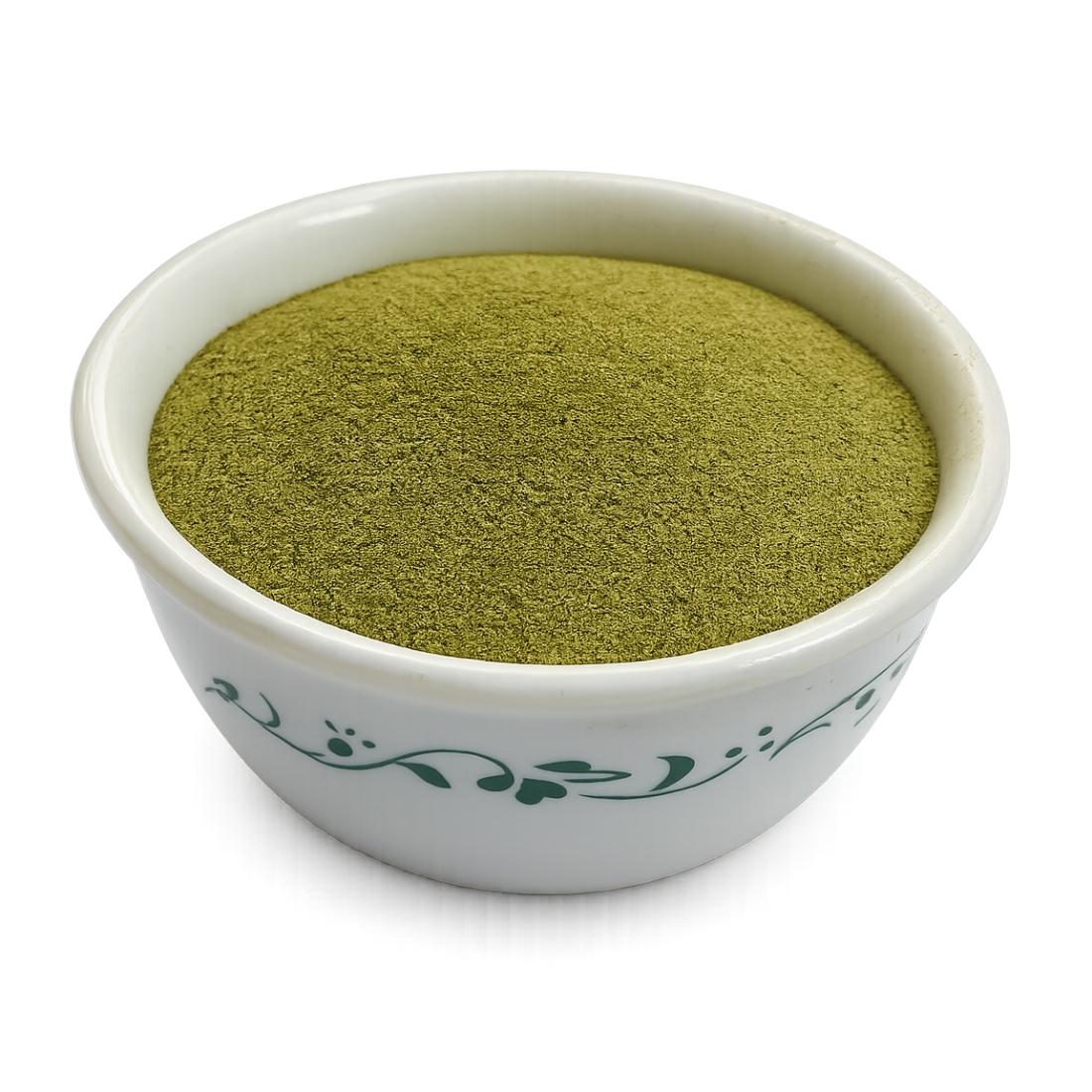 Senna leaves powder in a patterned white ceramic bowl