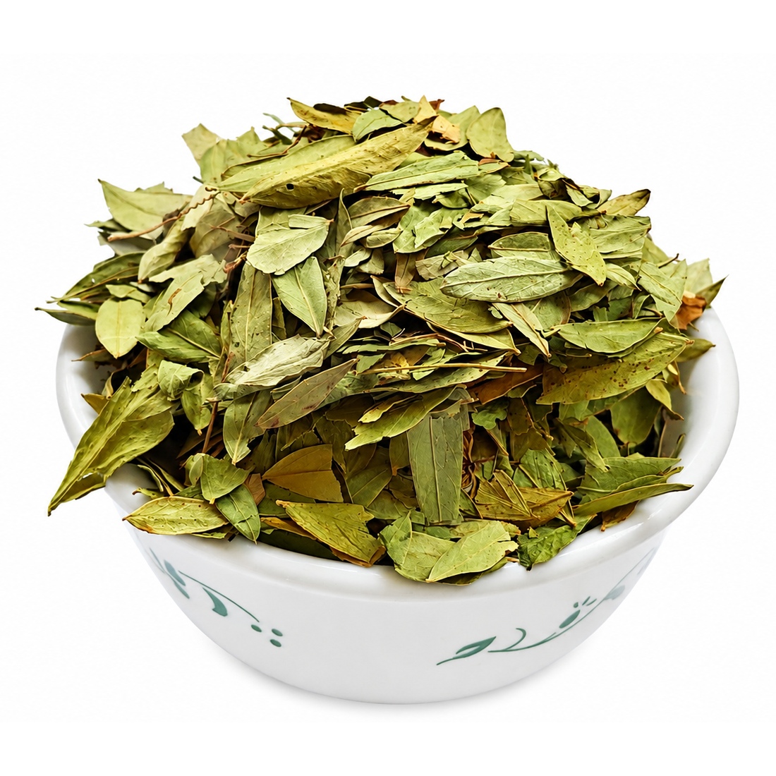 Dried senna leaves in a patterned white ceramic bowl